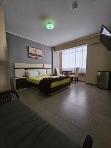 Shared lounge/TV area, Hotel La Suite de Angelique Huacho in Huacho