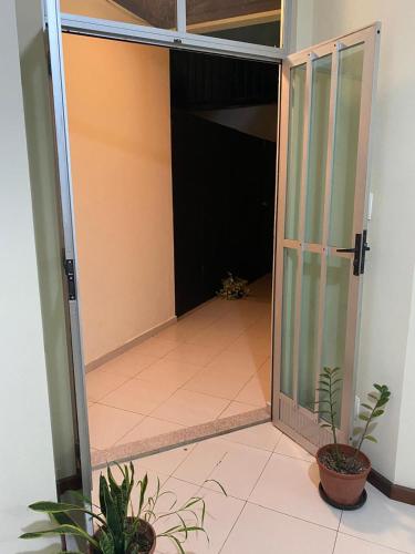 Quarto em apartamento in Centro da cidade