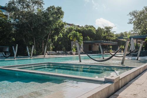 Séjour haut de gamme dans loasis verdoyante dAWA in Playa del Carmen, Mexico