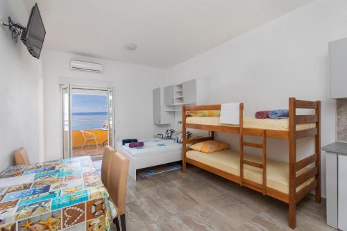 Apartments with parking space Krvavica, Makarska - 23540 in 加菲薩