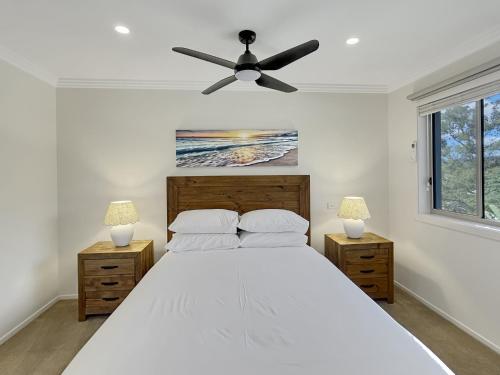 4-Bed Coastal Escape with Water & Garden Views