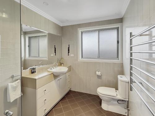 4-Bed Coastal Escape with Water & Garden Views