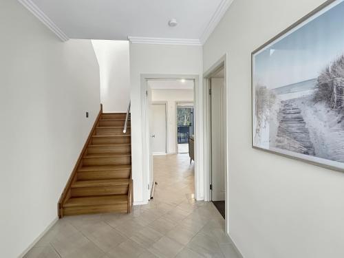 4-Bed Coastal Escape with Water & Garden Views