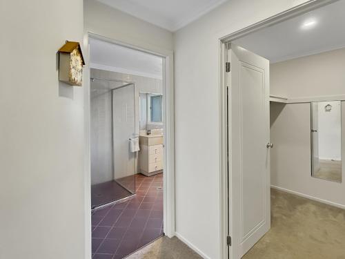 4-Bed Coastal Escape with Water & Garden Views