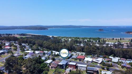 4-Bed Coastal Escape with Water & Garden Views