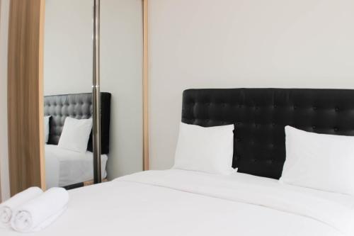 Cozy Studio at Monroe Tower Apartment By Travelio, Cikarang