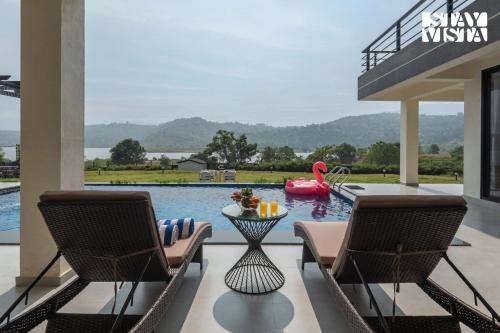 StayVista at Evara Villa - Pool, BBQ and Bonfire