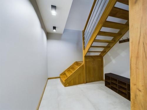ApartamentySnu, Dom na Przedmieściu