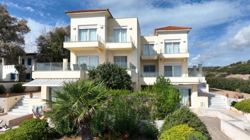 Viesnīcas āriene, KomiVillas in Emporios