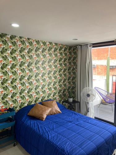 Bedroom with private bathroom and terrace right in Roma Norte in Mexico City, Mexico