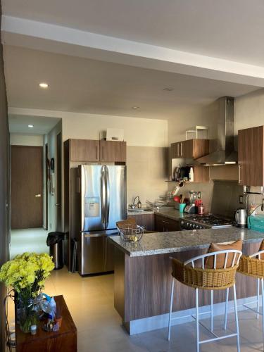 Bedroom with private bathroom and terrace right in Roma Norte in Mexico City, Mexico