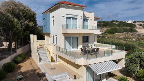 Viesnīcas āriene, KomiVillas in Emporios