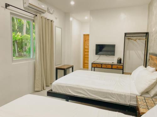 Avila's Horizon Dive Resort Santander Room Type - Family Room with Garden View