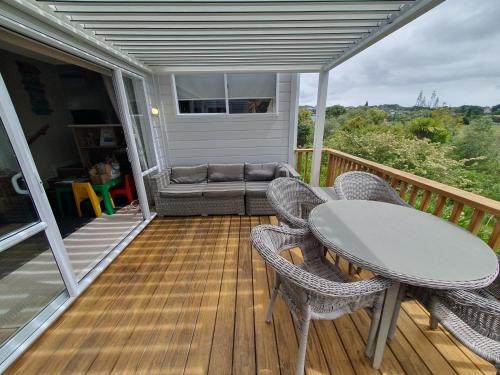 شرفة/ تراس, Stanmore Bay Beachfront Cottage in مانلي / وانجاباراوا