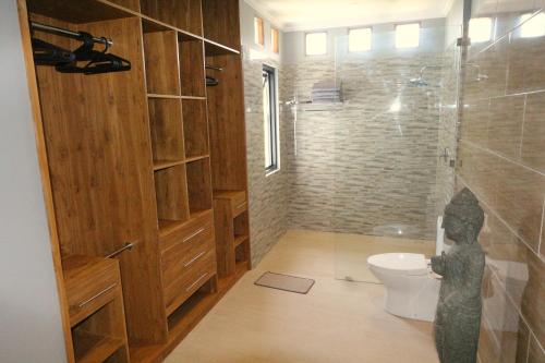 Villa Saujana, Beachvilla with 3 bedrooms - Tap to explore photos