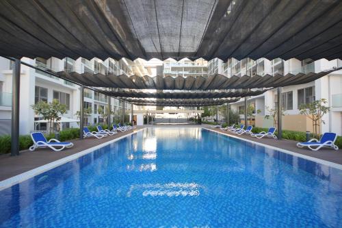 Silk Valley - Cozy 1BR near Yas Island AUH Airport - image 5