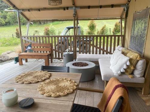 Bethells Luxury Retreat - Auckland Glamping in وايتاكير