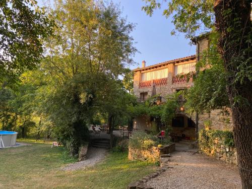 balkon/terras, Can Banal - Camping y Masia Rural in Montagut i Oix