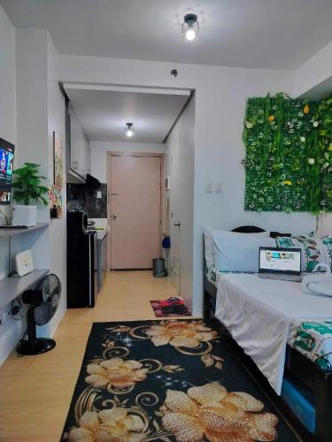 27th Floor Cozy Studio Unit with City View in Mplace, Marilao