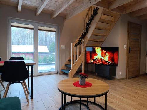 Dom wypoczynkowy Pod kasztanem 2 nad jeziorem in โรบุญ