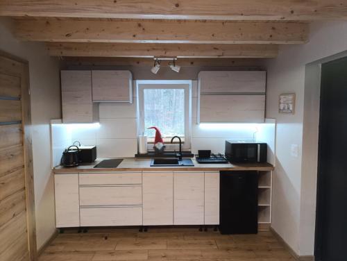 Dom wypoczynkowy Pod kasztanem 2 nad jeziorem in โรบุญ