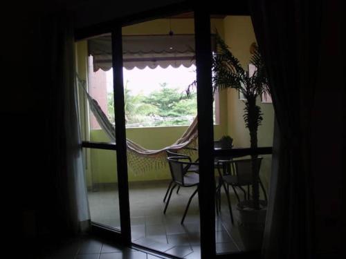 Apto com varanda Wi-Fi, Netflix - 400 m da praia in Jardim Virginia