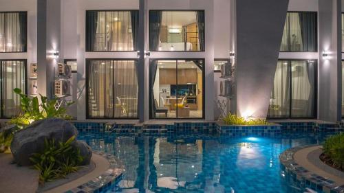 Duplex Condo pool access - Tap to explore photos