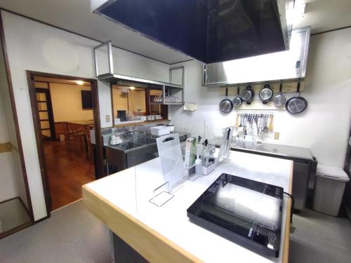 Kitchen, Hakuba Norikura Wakaguri Guesthouse in Hakuba