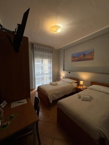 Domus Hotel - Tap to explore photos