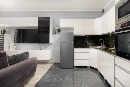 ห้องครัว, Modern Apartment Kapitański Mostek by Noclegi Renters (Modern Apartment Kapitanski Mostek by Noclegi Renters) in สรอดเมียสซีแย