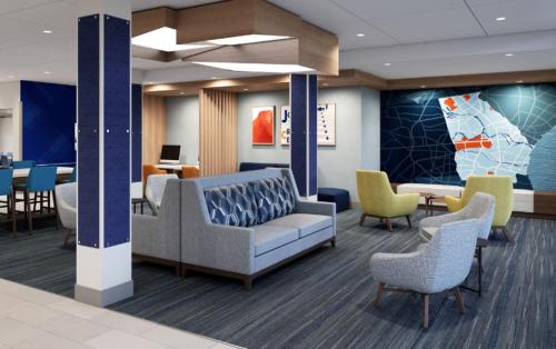 ห้องส่วนกลางสำหรับนั่งเล่น/ดูทีวี, Holiday Inn Express And Suites Stevensville Benton Harbor By IHG in สตีเว่นสวิลล์ (MI)