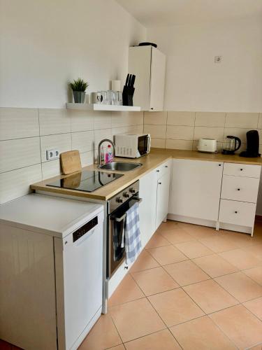 บริการและสิ่งอำนวยความสะดวก, Aura - Nulandt#2 - 2 Zimmer, 4 Betten, Küche, Balkon, Waschmaschine (Aura - Nulandt#2 - 2 Zimmer, 4 Betten, Kuche, Balkon, Waschmaschine) in เมอร์เซอบวร์ก