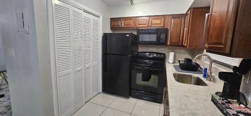 Konyha, Big TV 2 Bedroom Apartment Cooper City in Davie (FL)