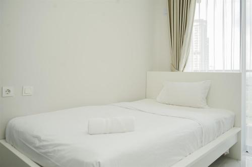 Minimalist Studio at Sky House BSD Apartment By Travelio