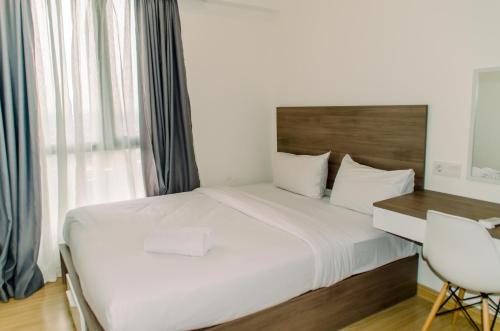 Elegant and Tidy 2BR at Sky House BSD Apartment By Travelio, Tangerang