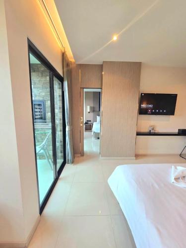618764483 The TJ Hotel Jomtien