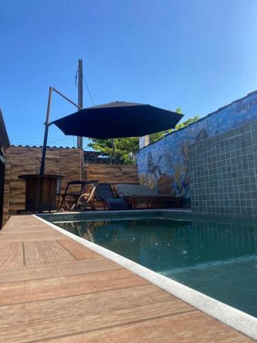 Casa com Piscina - Area da lazer familiar in Balneario Cidade Atlantica