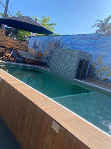 Casa com Piscina - Area da lazer familiar in Balneario Cidade Atlantica
