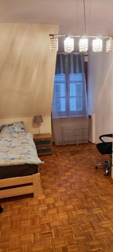 Chambre individuelle, salle de bain partagée