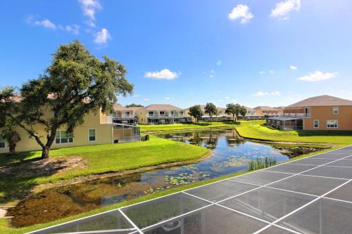 SERENITY 3 Bed 3 Bath Townhome with Pool, Private Balcony, Clubhouse, Communal Pool, Conservation View, Disney 15 mins by Orlando Holiday Rental Homes LLC 17401 in Orlando, USA