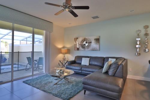 SERENITY 3 Bed 3 Bath Townhome with Pool, Private Balcony, Clubhouse, Communal Pool, Conservation View, Disney 15 mins by Orlando Holiday Rental Homes LLC 17401 in Orlando, USA