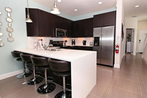 SERENITY 3 Bed 3 Bath Townhome with Pool, Private Balcony, Clubhouse, Communal Pool, Conservation View, Disney 15 mins by Orlando Holiday Rental Homes LLC 17313 in Orlando, USA