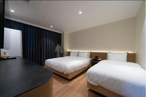 김해 넘버25호텔 내외점 (No25 Hotel Naeoe) 호텔 스위트룸