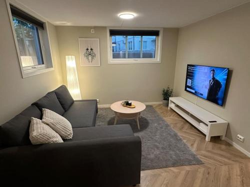 Skupni salon/TV območje, Modern Central Apartment Apt 106 in Lagard