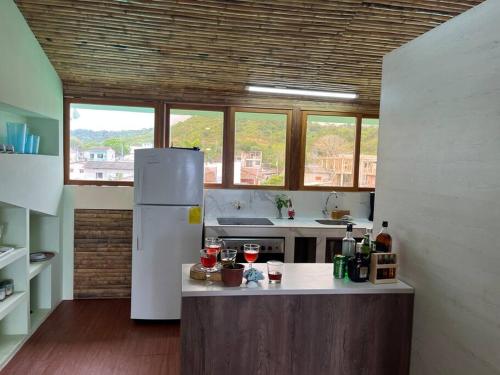 Cucina, Suite Mikuna con vista al mar in Olon