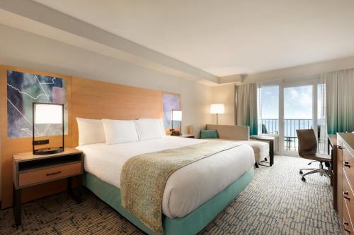 Surfbreak Virginia Beach Oceanfront, an Ascend Collection Hotel Room Type - King Room with Patio - Non-Smoking
