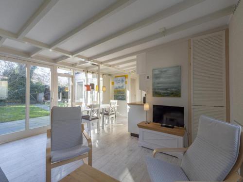  Lovely bungalow on green park with patio in Sint Maartensvlotbrug