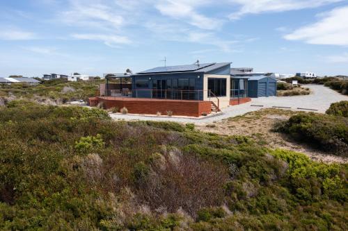 Viesnīcas āriene, 100m² 2 guļamistaba, 1 privāta vannas istaba Māja Lulworth
 (Seaspray Beach House) in Lulworth