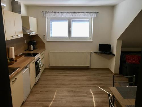 Kitchen, Sebastian Apartments in Trebon