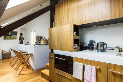 Small Triplex, Париж